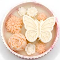 Kerze Schmetterlingsbrise - Weiß / Rosa / Milch, Honig
